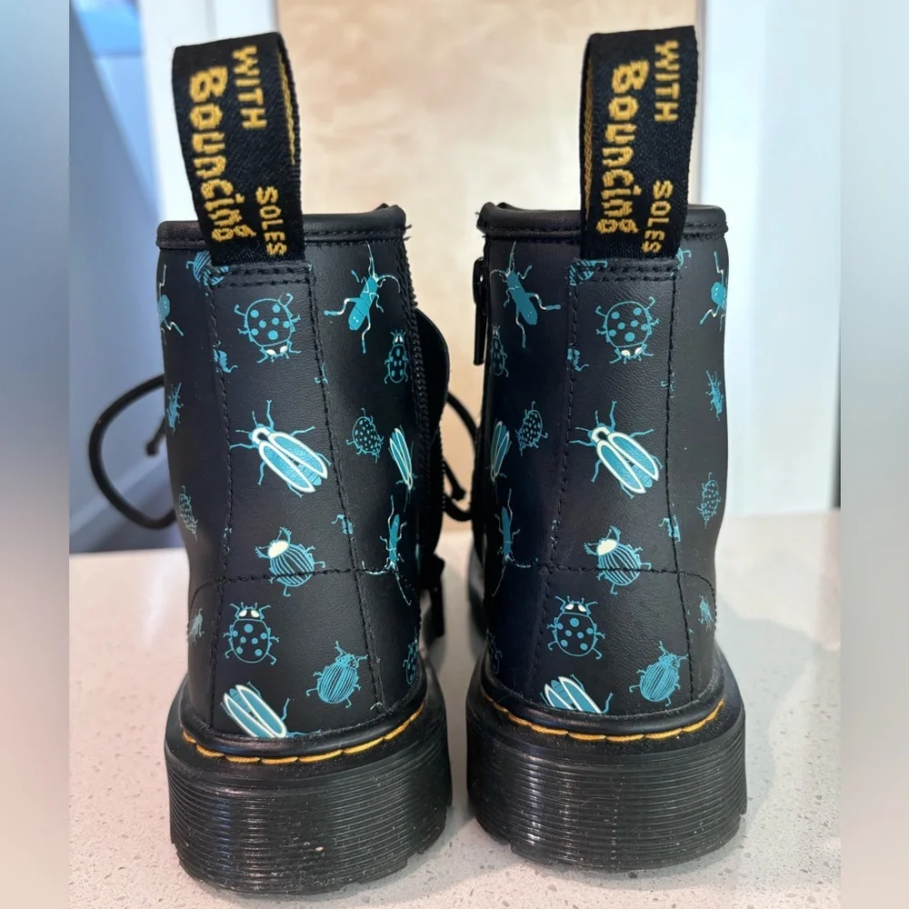 Dr. Martens Kids Black Boots with Teal Bug Print